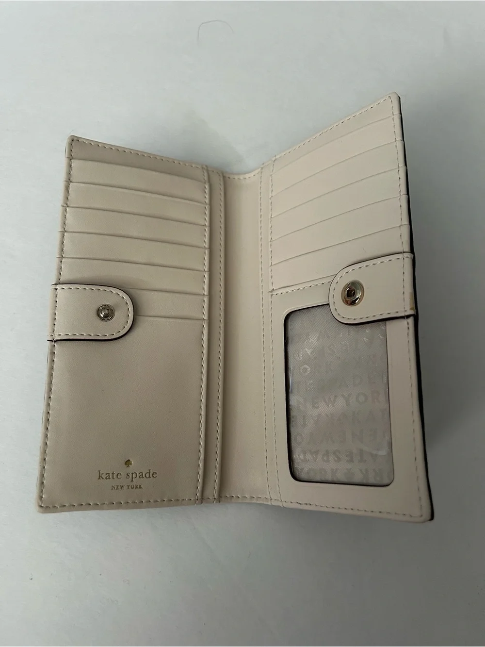 Kate Spade navy blue zip wallet with gold logo
